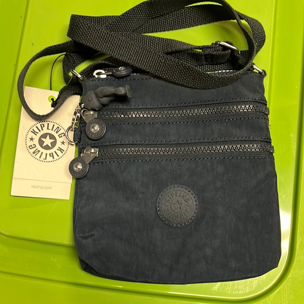 New with tag Kipling bag in navy blue